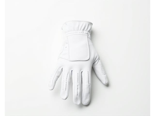 A white synthetic golf glove laid flat.